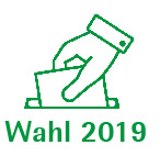 Grafik in Grün: Hand steckt Briefumschlag in Schlitz, darunter der Schriftzug "Wahl 2019"
